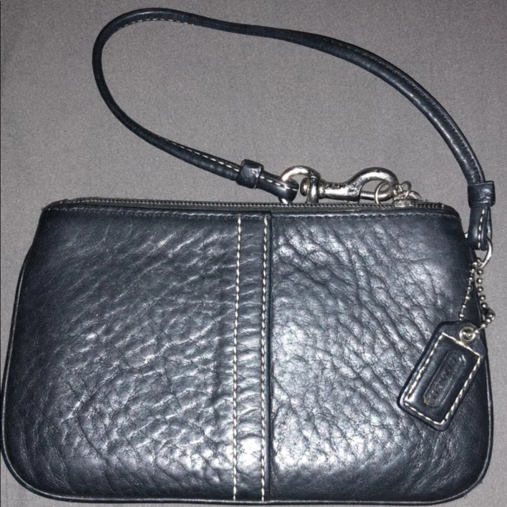 Two leather Coach wristlets